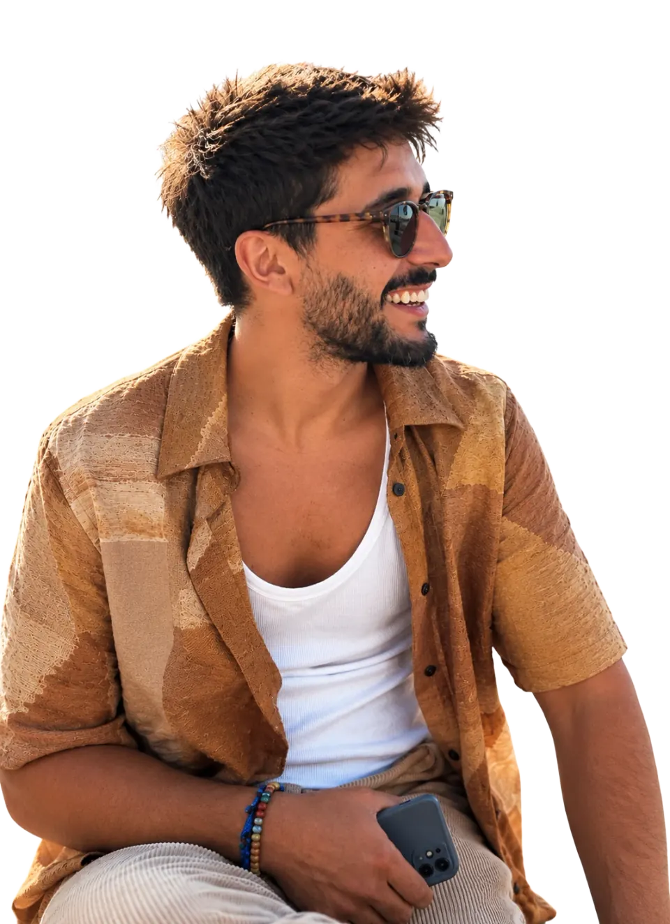 Ricardo, smiling, looking at the invitation